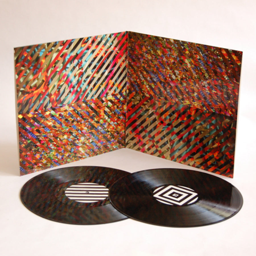 urlupload/https://www.mergerecords.com/stuff/contentmgr/files/0/d6d5104114604c05e56e16a14037bffb/image/348_caribou_swim_lp3_500px.jpg